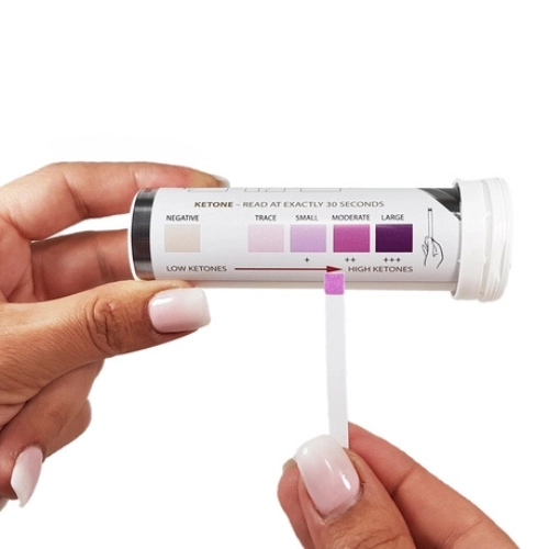 Urine ketone test strip showing color scale for ketone levels, from negative to large, used to detect diabetic ketoacidosis (DKA).